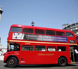 Nelson's Column and red london bus Trafalgar Square London England